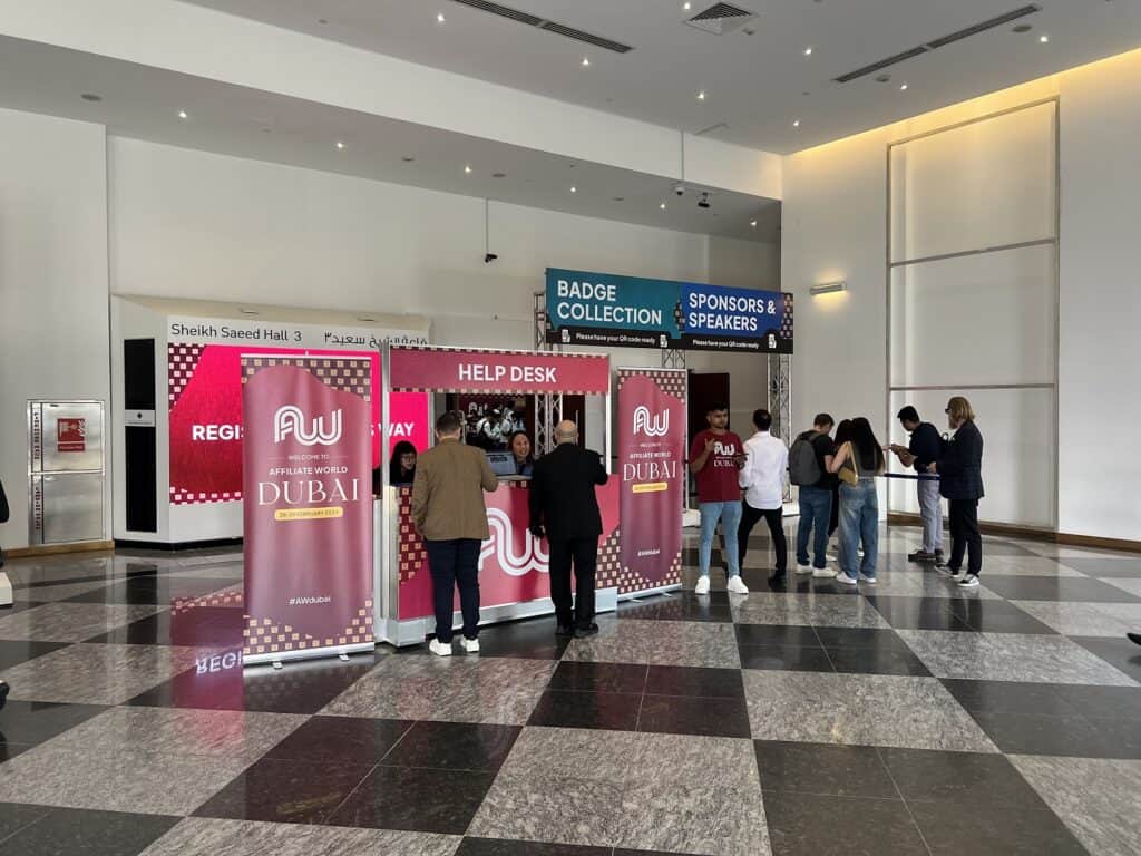 My Takeaways from Affiliate World Dubai 2024 - Dubai Gold Decoded 2 AW Dubai - Registration Desk